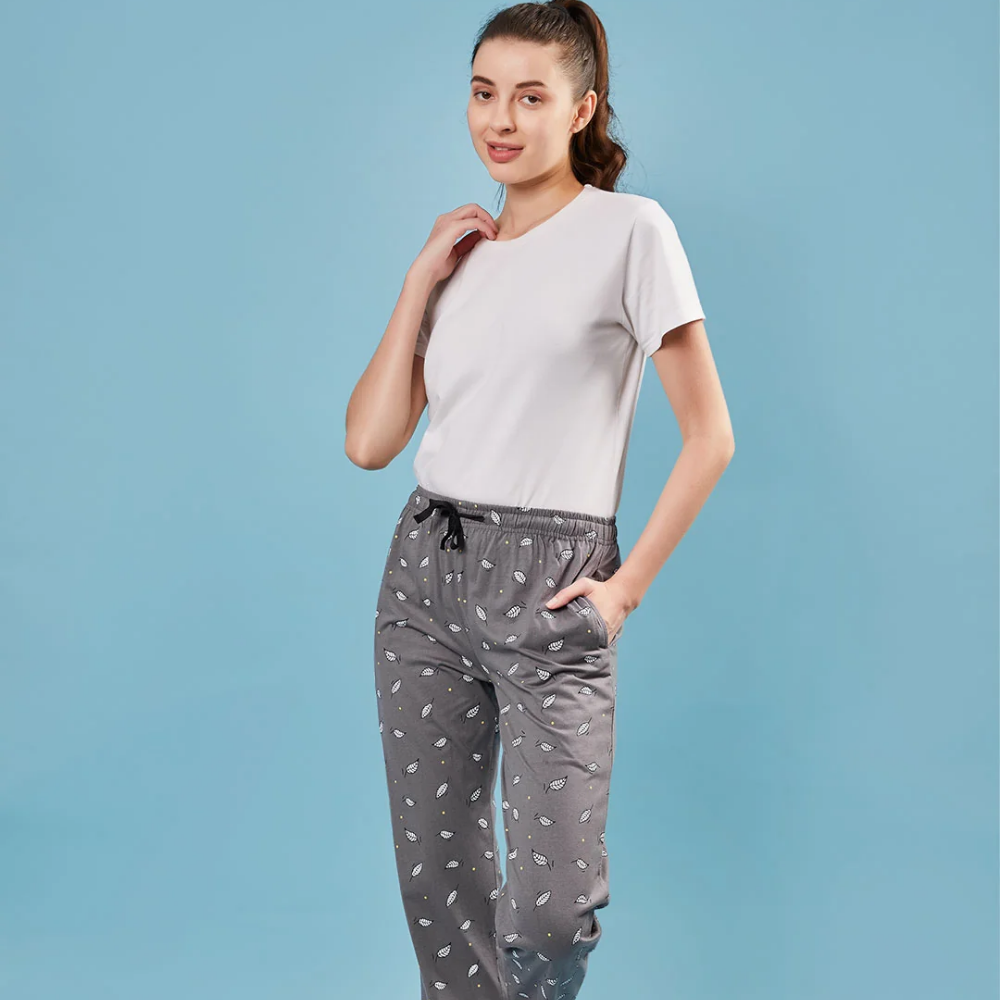 woman white t-shirt and grey pant